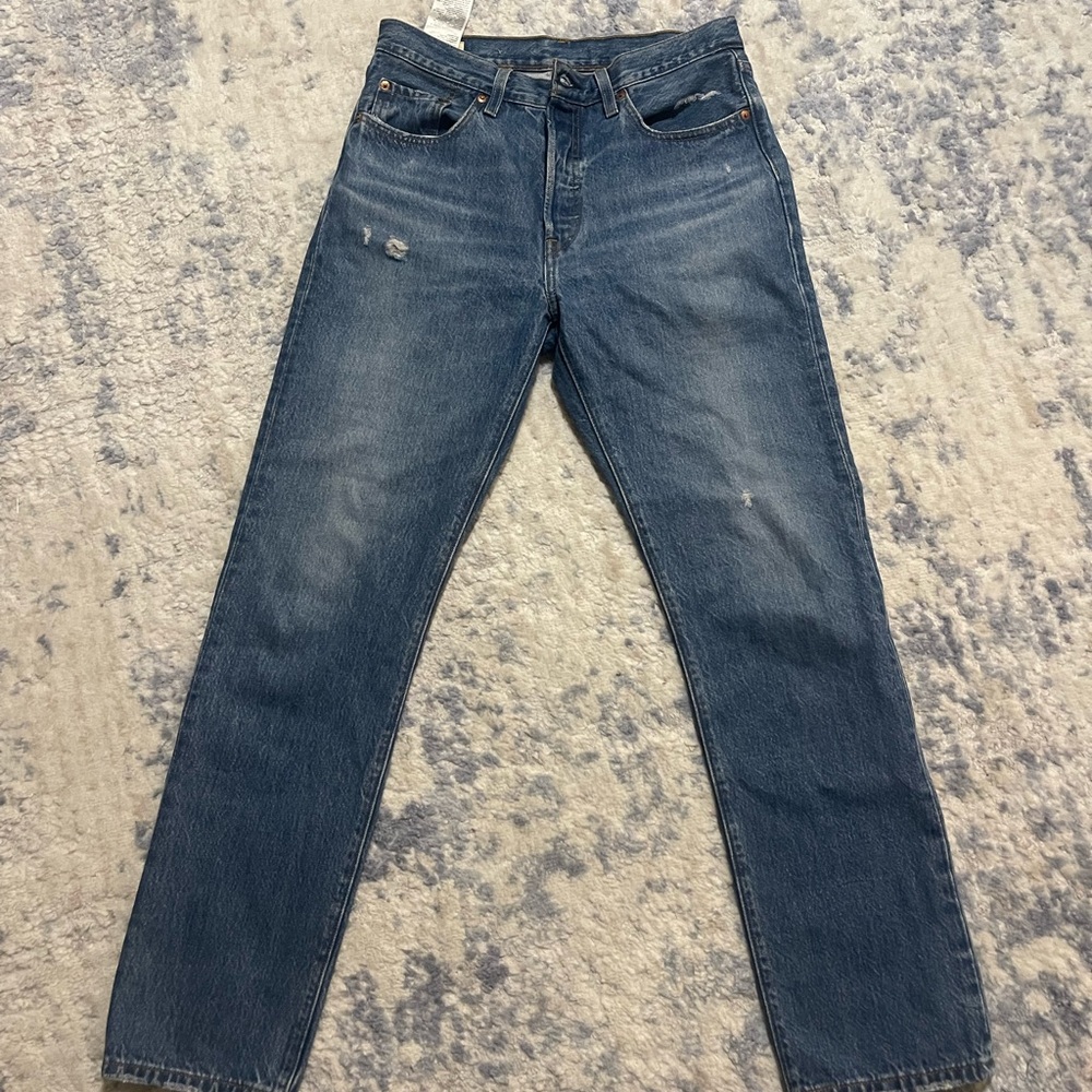 Woman’s 501 Levi jeans.